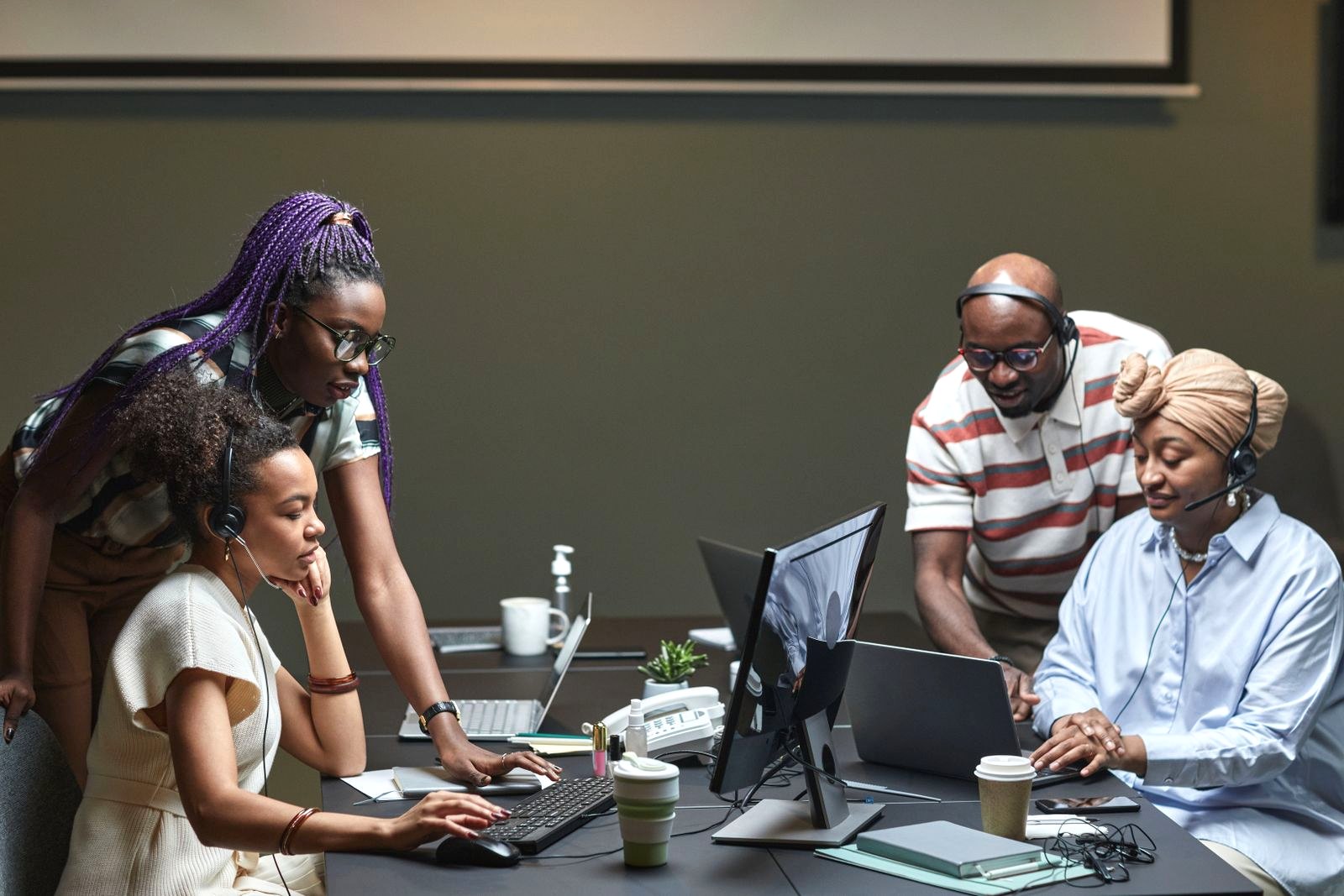 Customer support agents working together